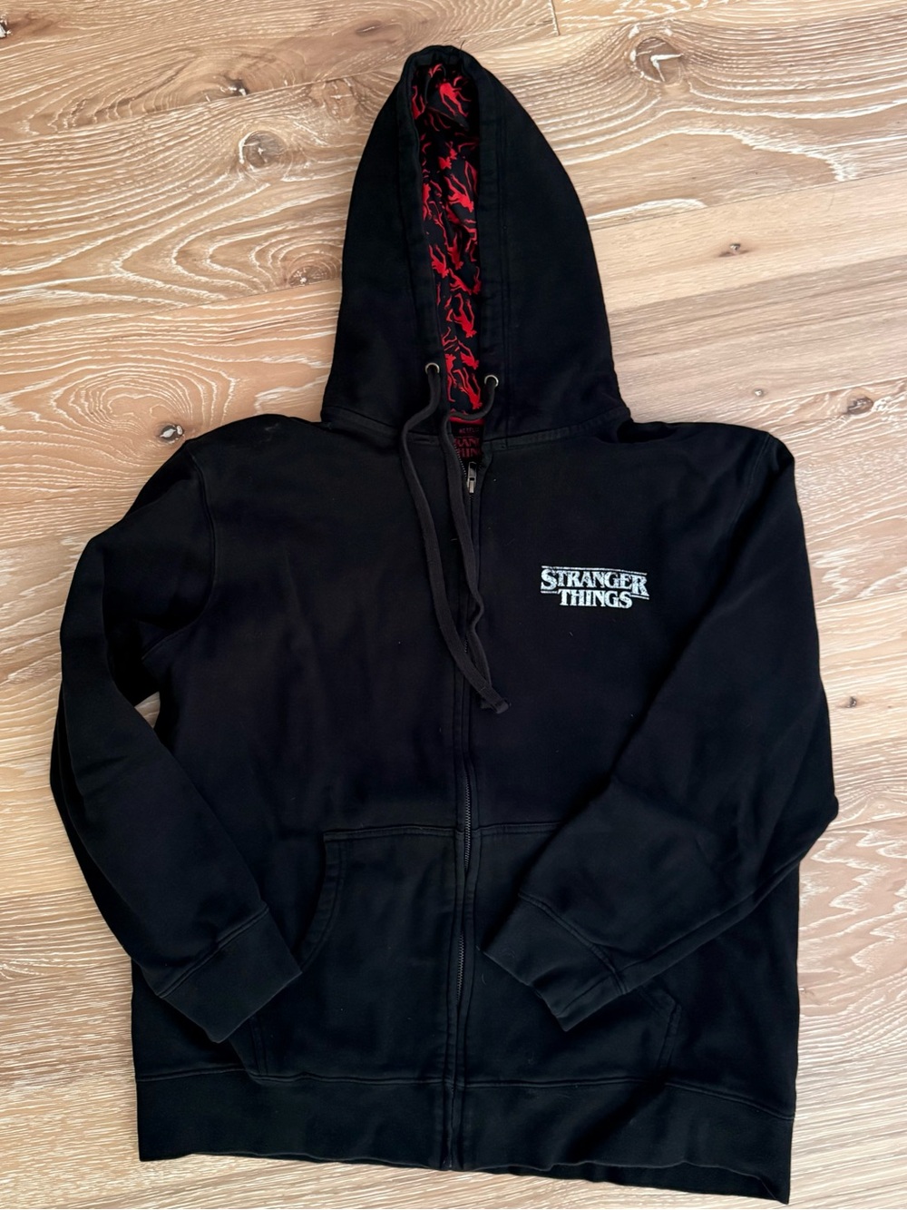 Netflix Black Hoodie with Red Patterned Hood Lining
